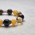 Close-up Detail of Earth Element Crystal Beads - Tiger Eye and Yellow Jasper Gemstones for Enhancing Security and Balance - 8fortune